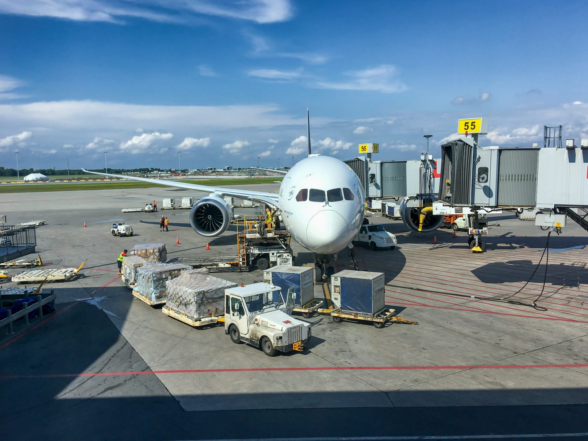 a large jetliner sitting on top of an airport tarmac
